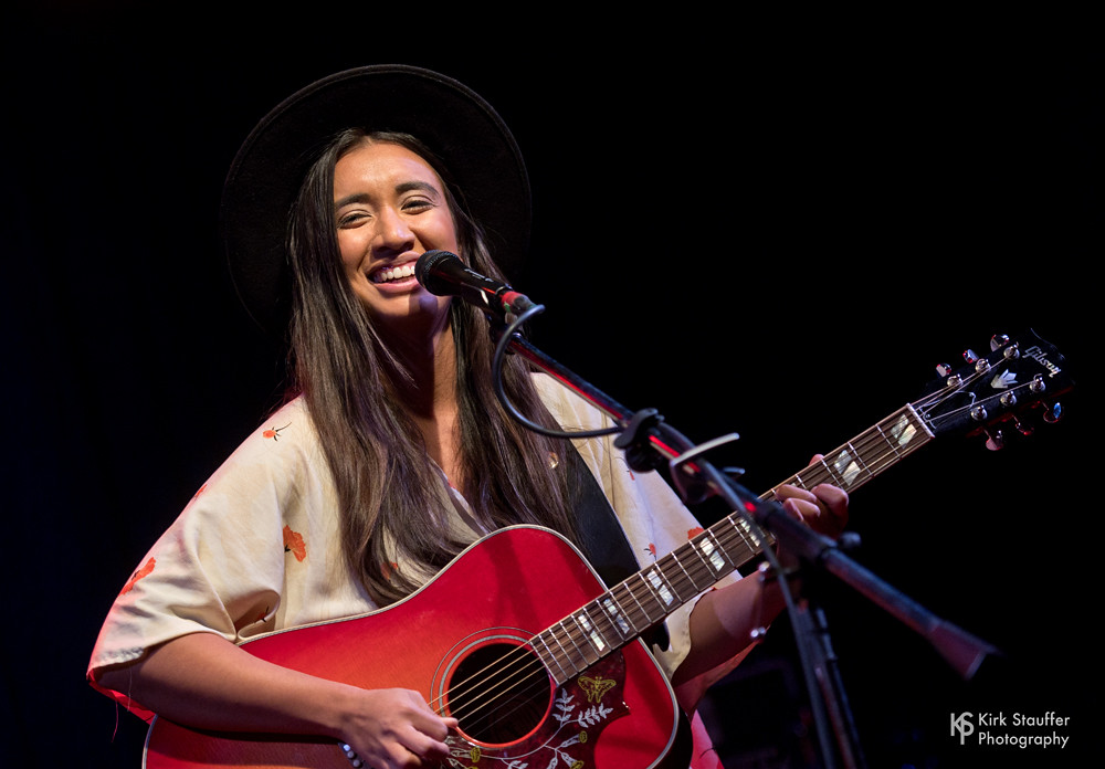 Raye Zaragoza performing with guitar
